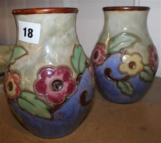 Pair of Royal Doulton floral painted baluster vases